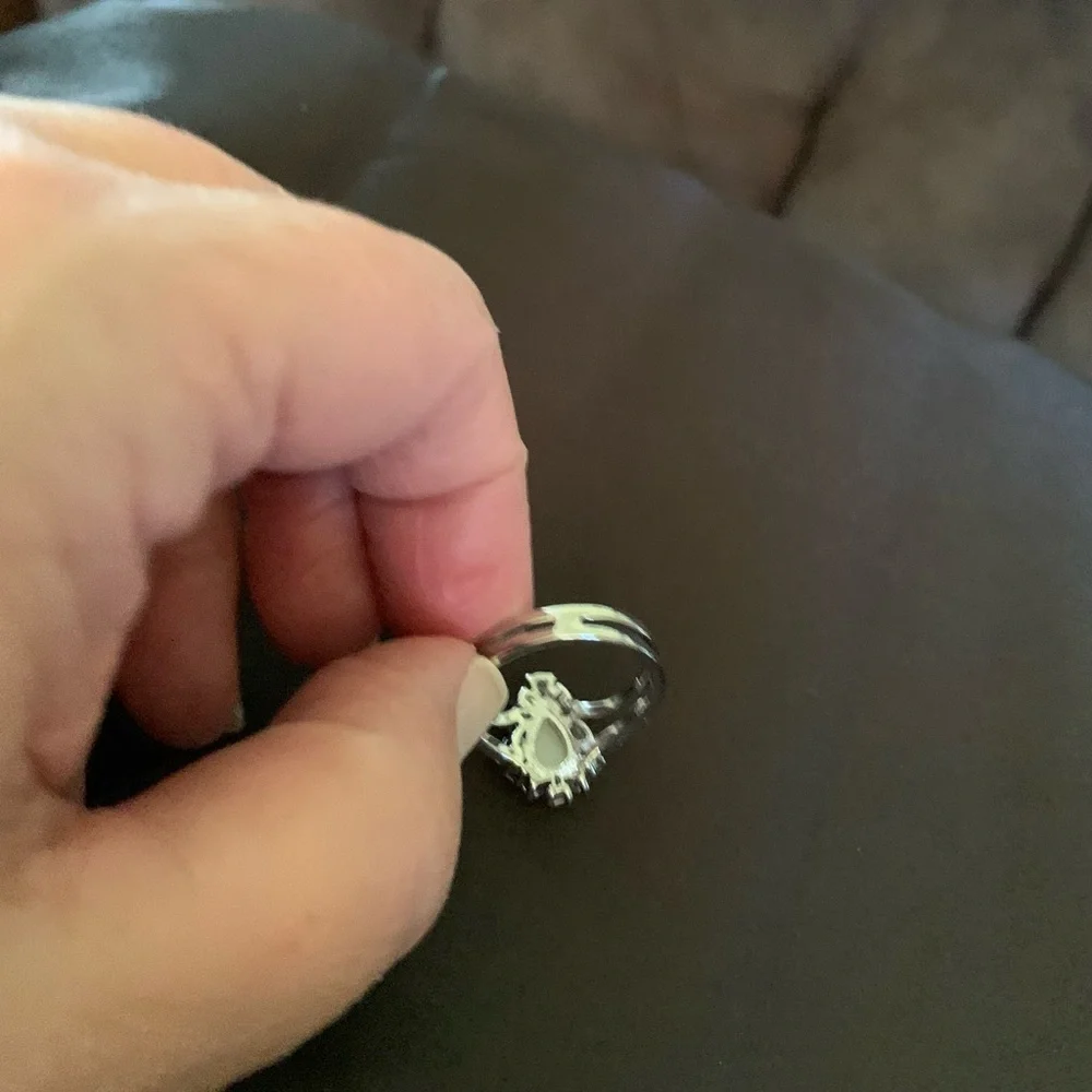 Silver tone teardrop shape faux pearl ring with crystals